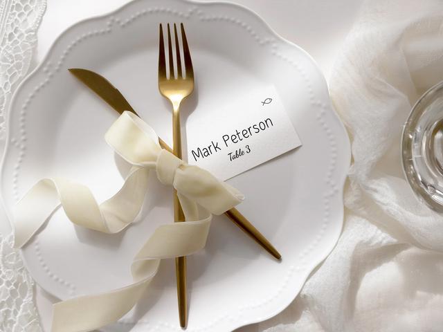 Elevate your table settings with these elegant place cards, beautifully paired with gold flatware and a delicate ribbon. Perfect for weddings or upscale events, the personalized cards add a sophisticated touch while ensuring a seamless guest experience. Create a luxurious atmosphere that leaves a lasting impression.