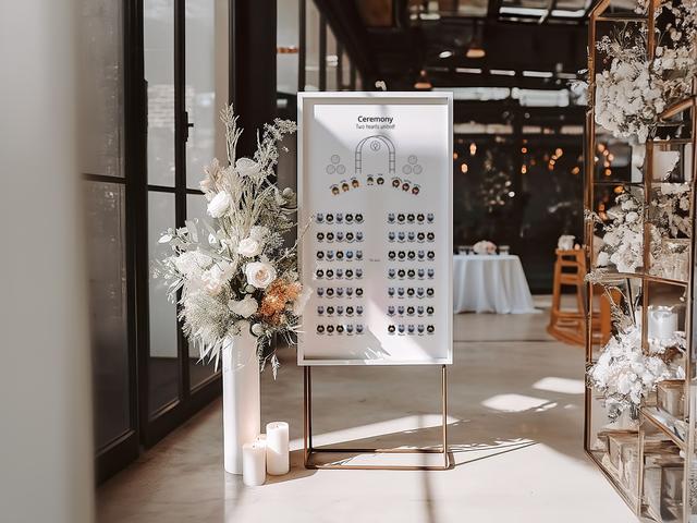 Guide your guests in style with this elegant ceremony seating chart. Perfect for weddings, its sleek design is complemented by beautiful floral arrangements, creating a sophisticated and welcoming atmosphere for your special day.