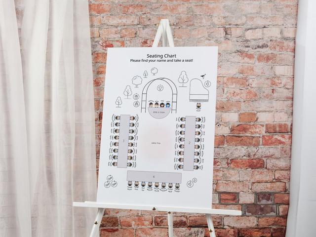 Experience seamless event planning with our elegantly designed seating chart, perfect for weddings, corporate events, or any special occasion. This sophisticated chart, set against a rustic brick backdrop, offers clear, organized seating arrangements to ensure your guests find their seats effortlessly.