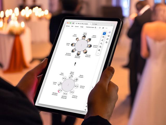 Simplify your event planning with our interactive digital seating chart, perfect for modern weddings and sophisticated events. This image captures the convenience of using a tablet to manage and customize seating arrangements in real-time, ensuring each guest is comfortably placed. Set against a backdrop of a beautifully lit reception, this tool allows for easy adjustments and instant updates, making event coordination seamless.